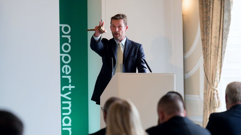 Novice auctioneer on rostrum