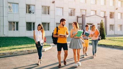 Student group walking outside of college